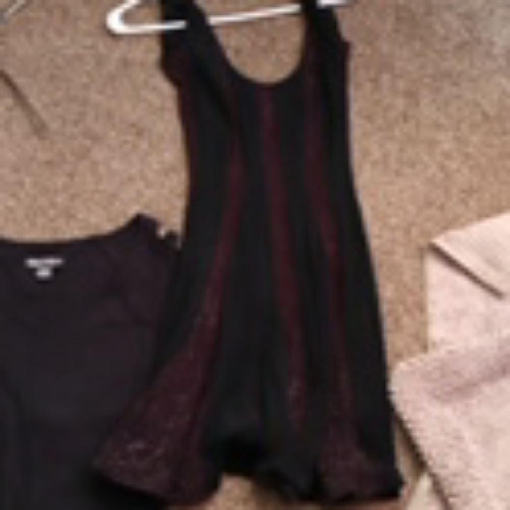 Very cute black and sparkly dress.  Size med.cute